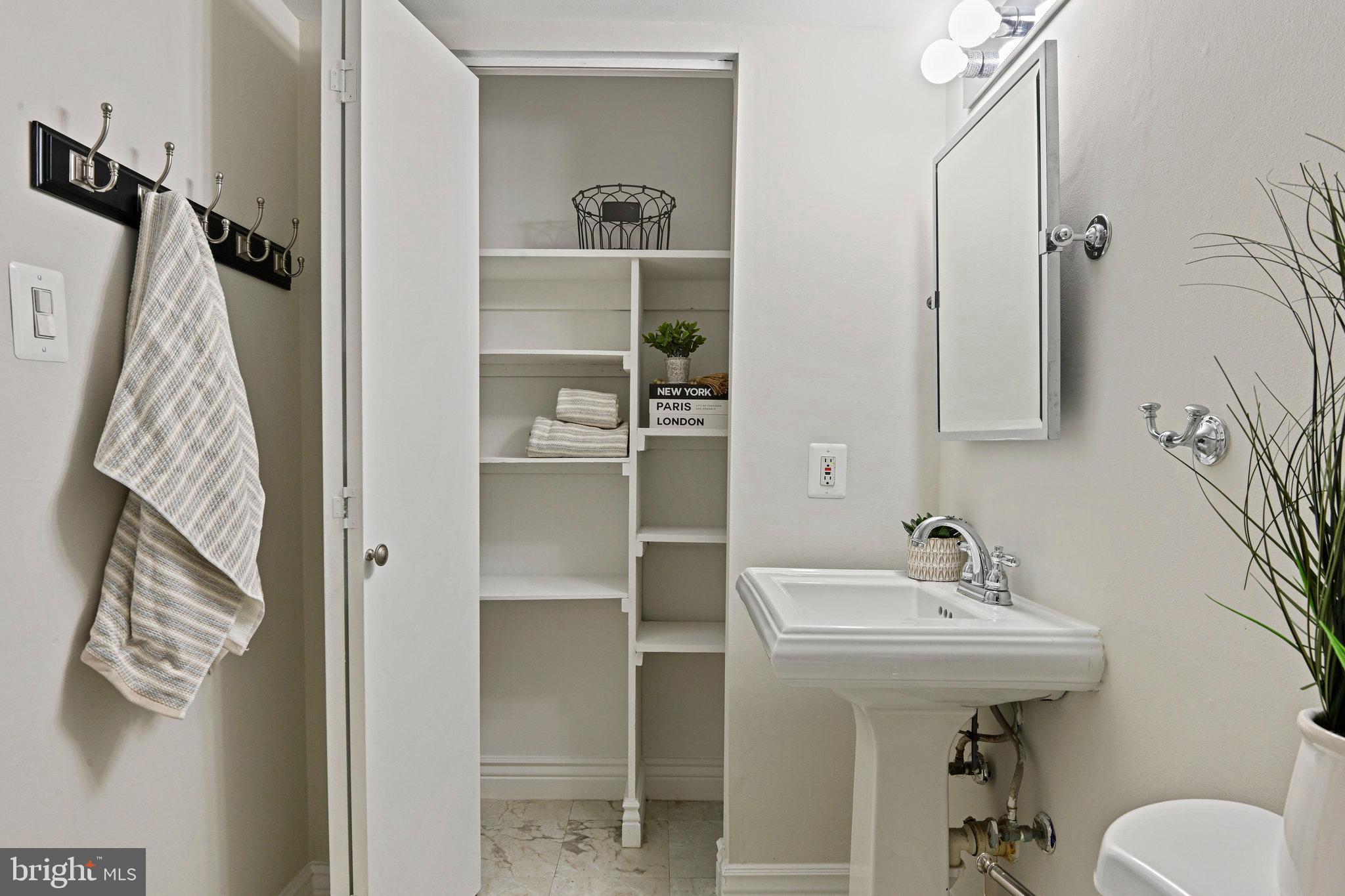 11625 Vantage Hill Road, Unit C Reston, VA 20190 - Photo 14 of 35 a bathroom with a sink toilet and shower