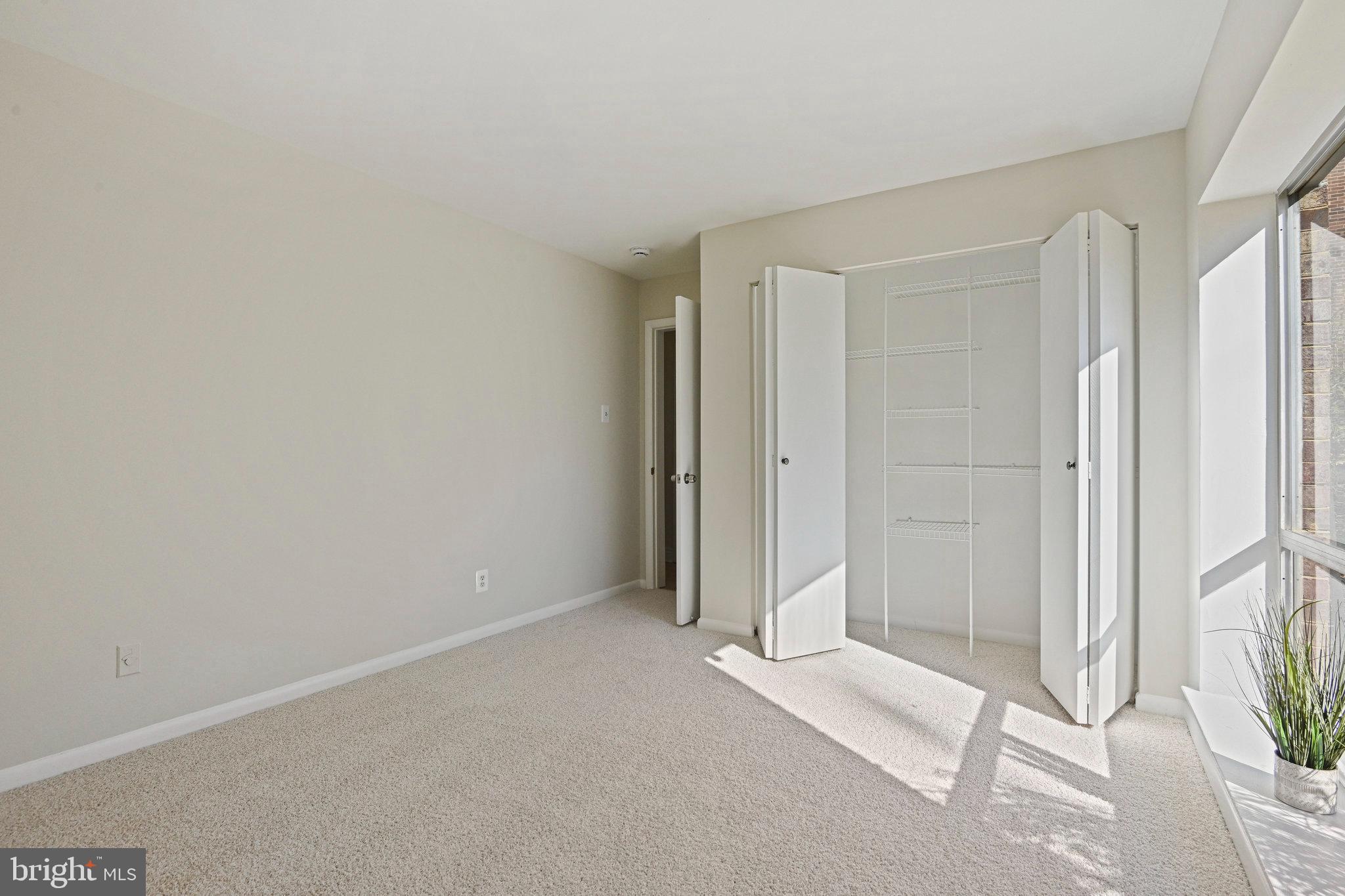 11625 Vantage Hill Road, Unit C Reston, VA 20190 - Photo 20 of 35 wooden floor and glass door in a room
