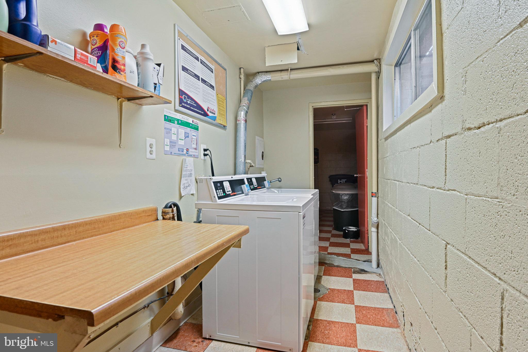 11625 Vantage Hill Road, Unit C Reston, VA 20190 - Photo 29 of 35 a utility room with dryer and washer