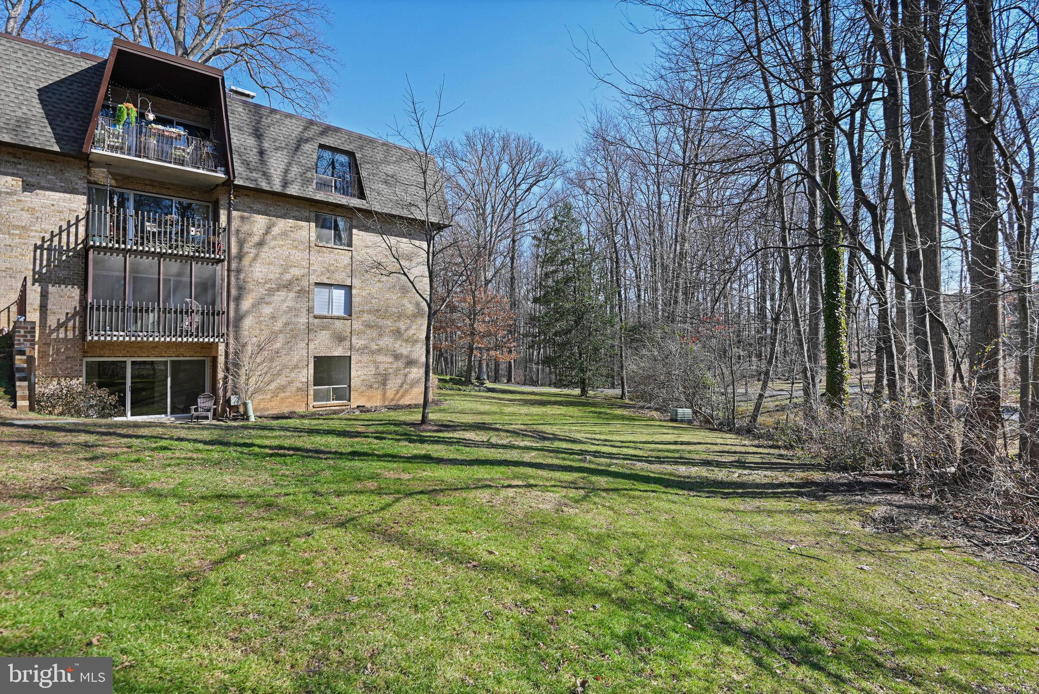 11625 Vantage Hill Road, Unit C Reston, VA 20190 - Photo 32 of 35 a front view of a house with a yard
