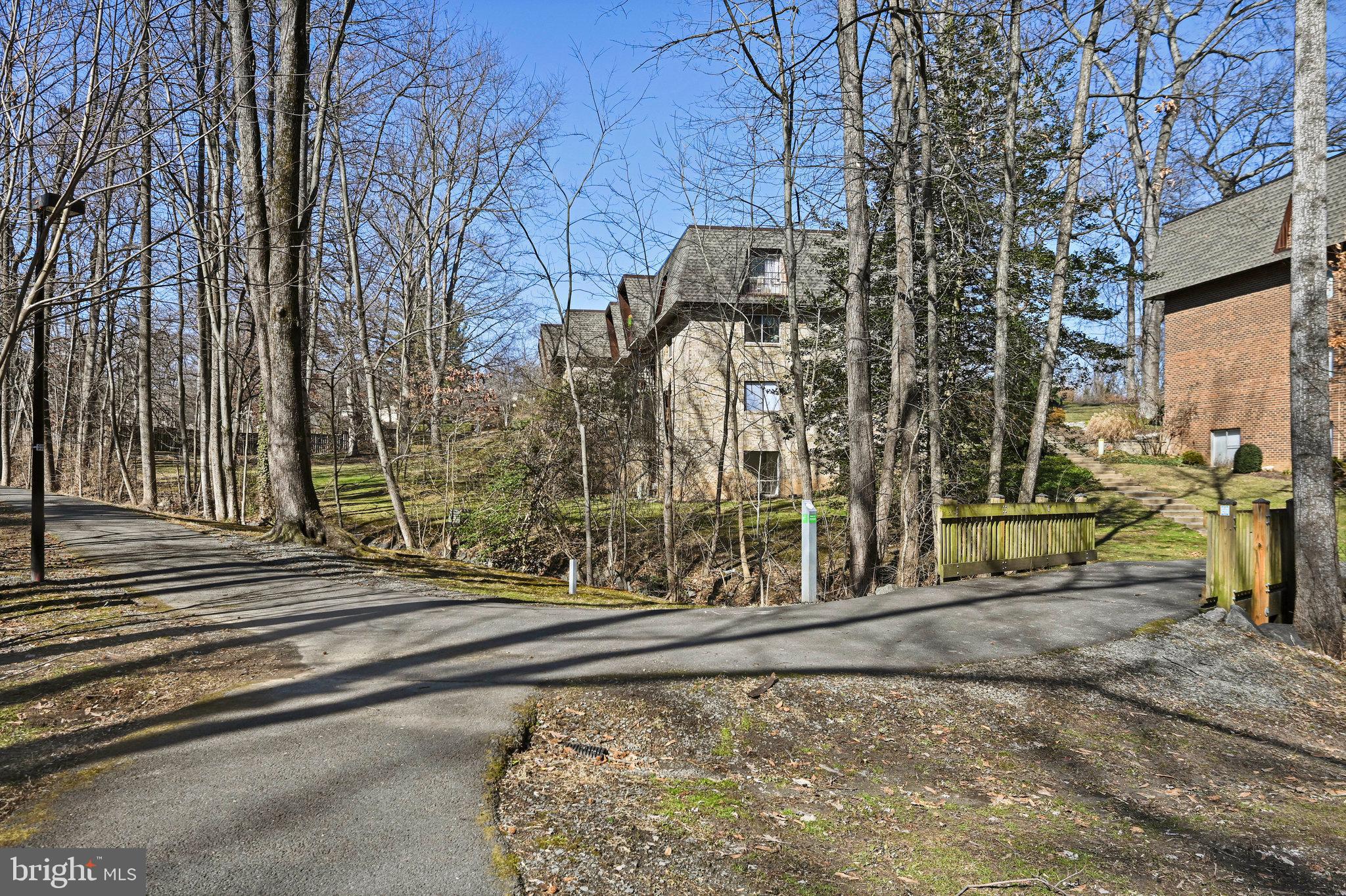 11625 Vantage Hill Road, Unit C Reston, VA 20190 - Photo 34 of 35 a view of a pathway of a house