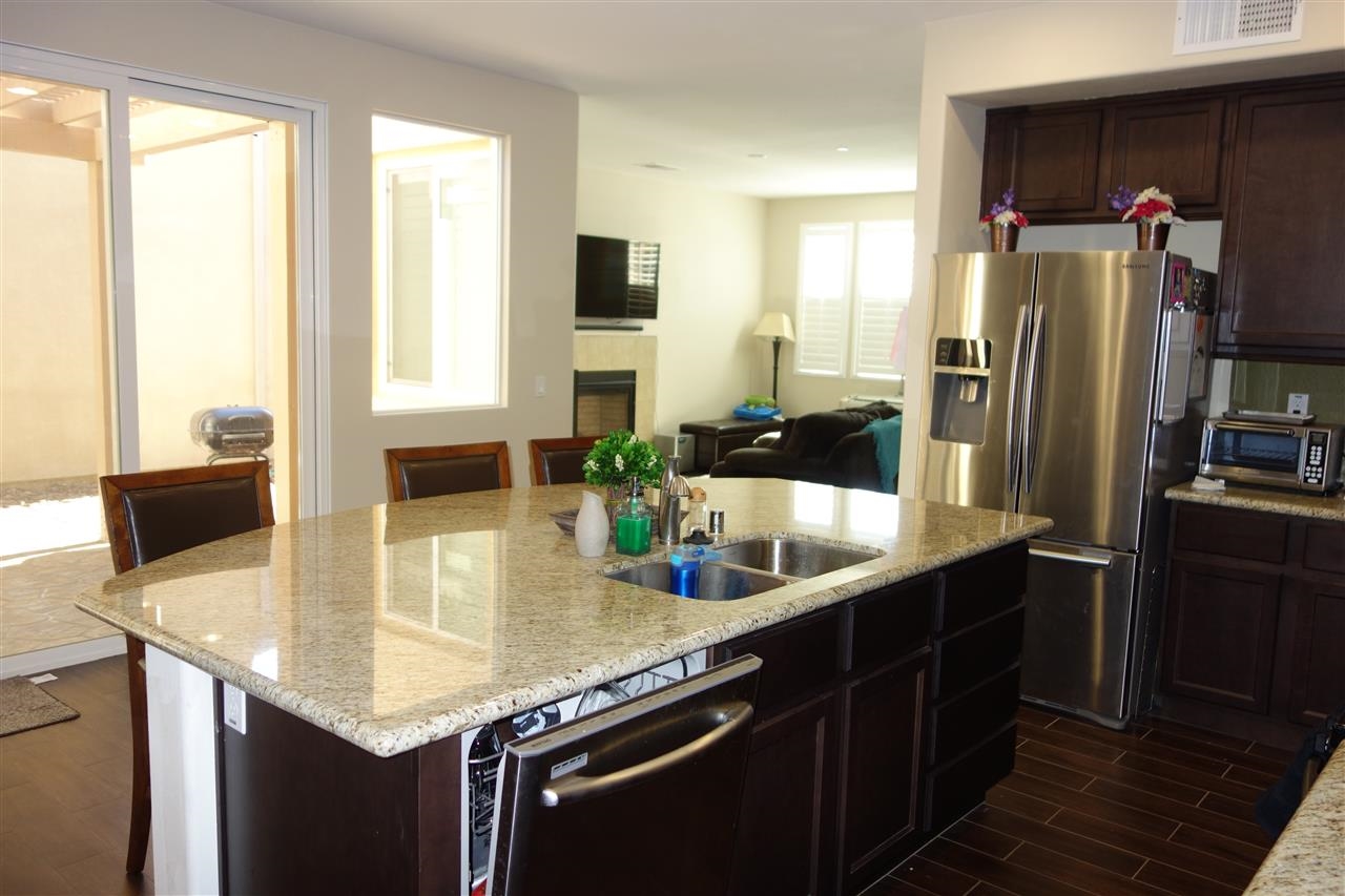 1261 Pershing Road Chula Vista, CA 91913 - Photo 7 of 7 Large open floorplan great for entertaining. Kitchen peers into the living room & backyard!