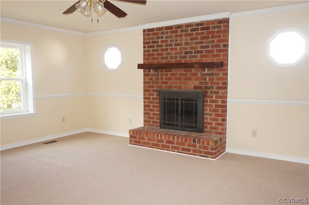 3237 Fielding Road Colonial Heights, VA 23834 - Photo 3 of 21 an empty room with windows and fireplace