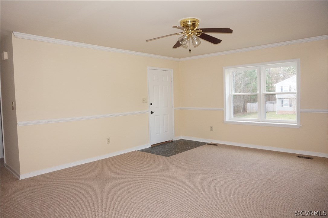 3237 Fielding Road Colonial Heights, VA 23834 - Photo 5 of 21 an empty room with a window and a ceiling fan