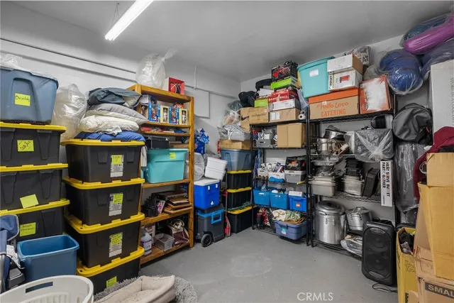 a room with storage and a white cabinets