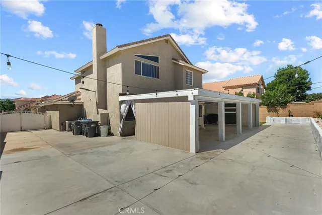 a view of a house with a patio