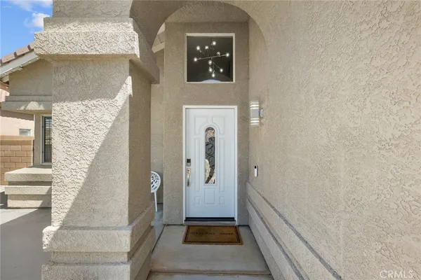 a view of a hallway with windows