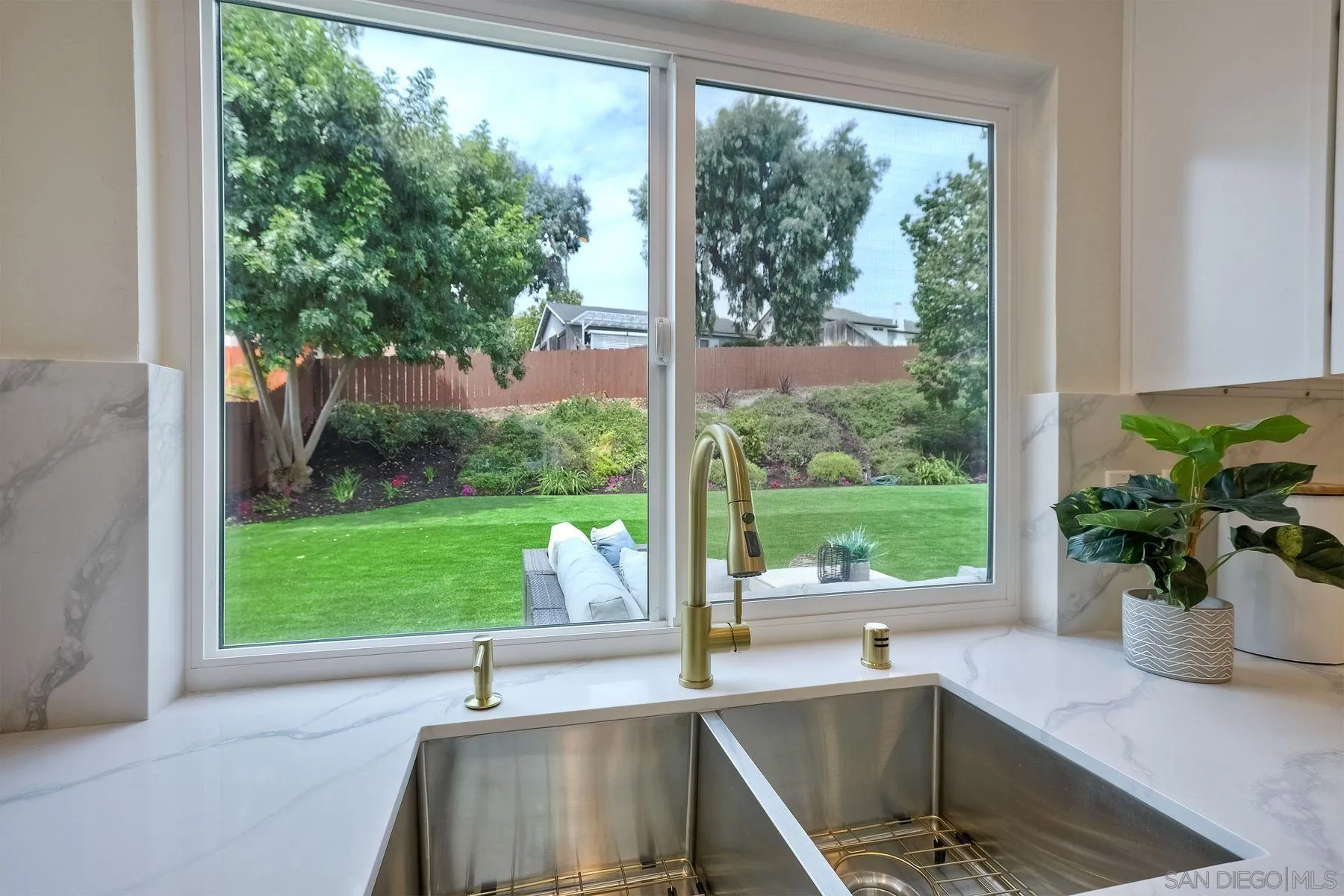 3577 Winslow Road Oceanside, CA 92056 - Photo 18 of 42 a view of a garden from a living room