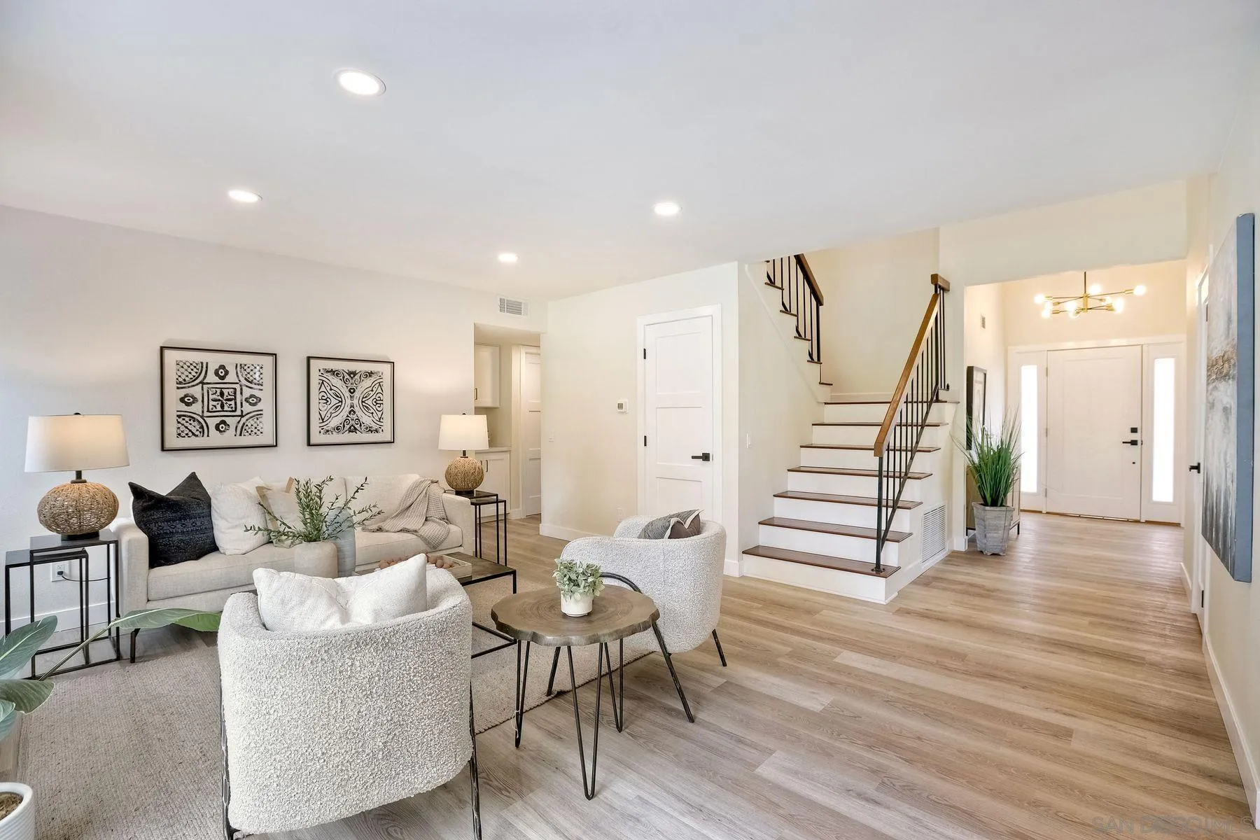 3577 Winslow Road Oceanside, CA 92056 - Photo 20 of 42 a living room with furniture and wooden floor
