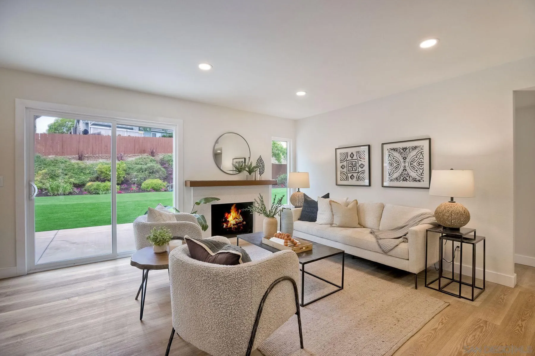 3577 Winslow Road Oceanside, CA 92056 - Photo 21 of 42 a living room with furniture and a fireplace