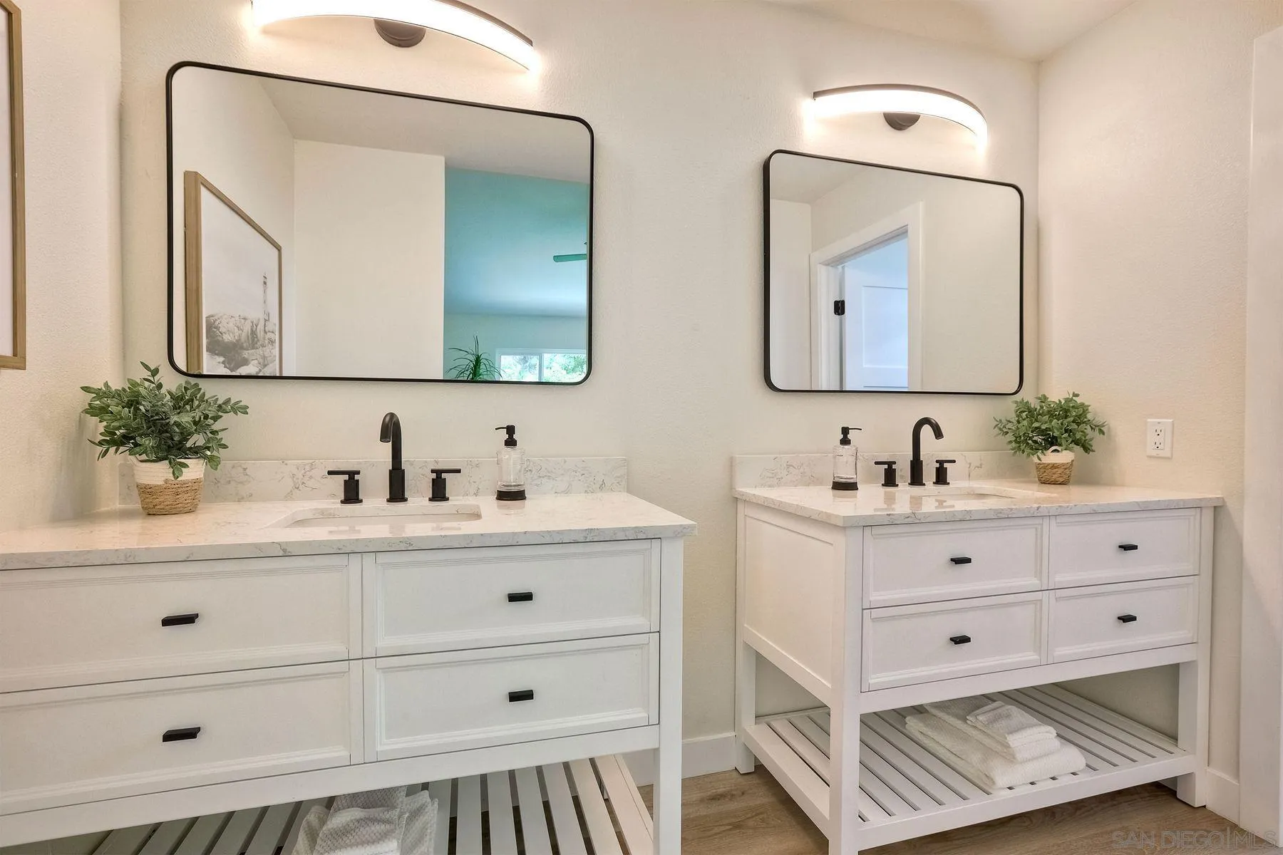3577 Winslow Road Oceanside, CA 92056 - Photo 29 of 42 a bathroom with a double vanity sink mirror and