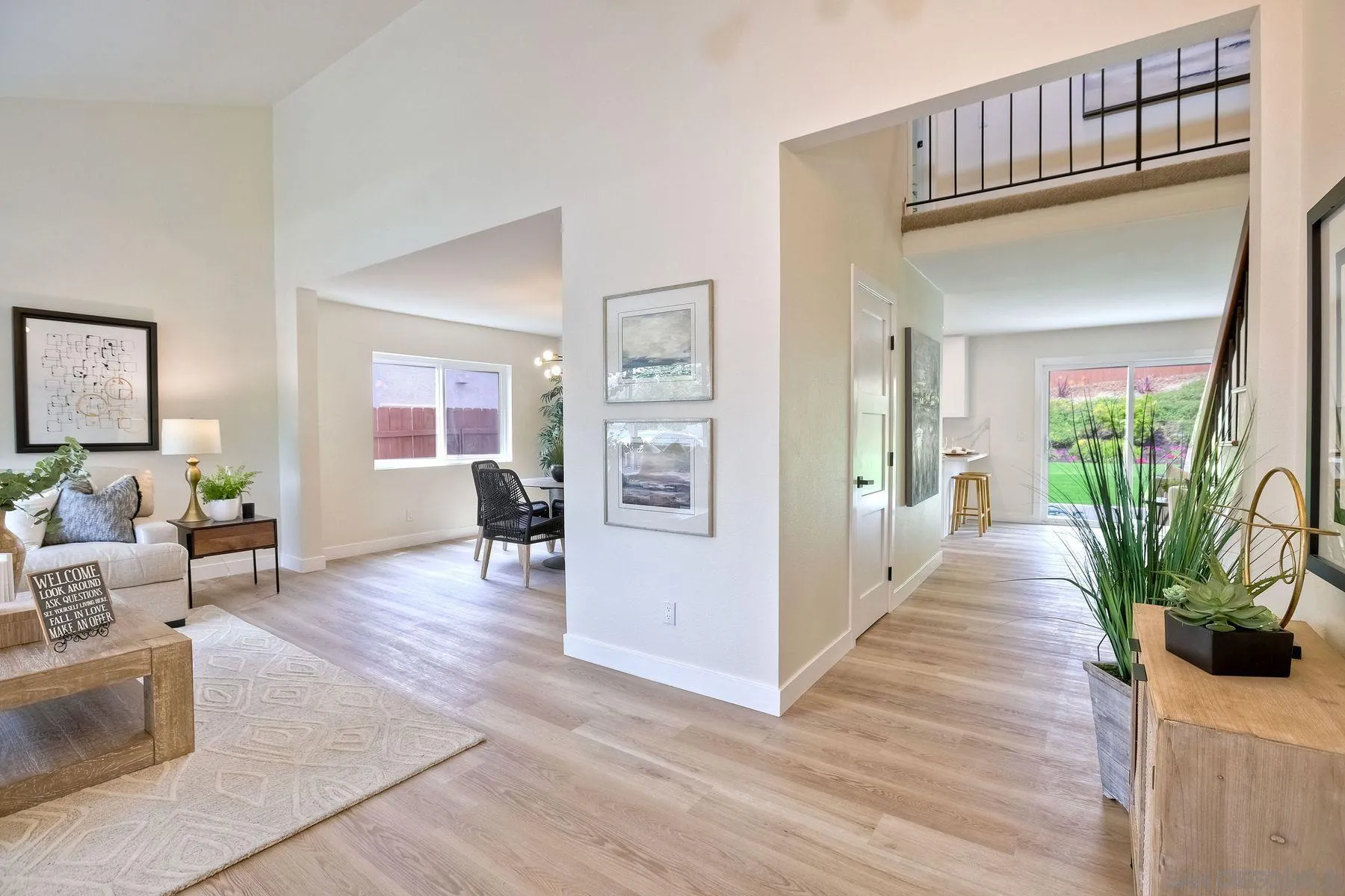 3577 Winslow Road Oceanside, CA 92056 - Photo 9 of 42 a view of a livingroom with wooden floor and furniture