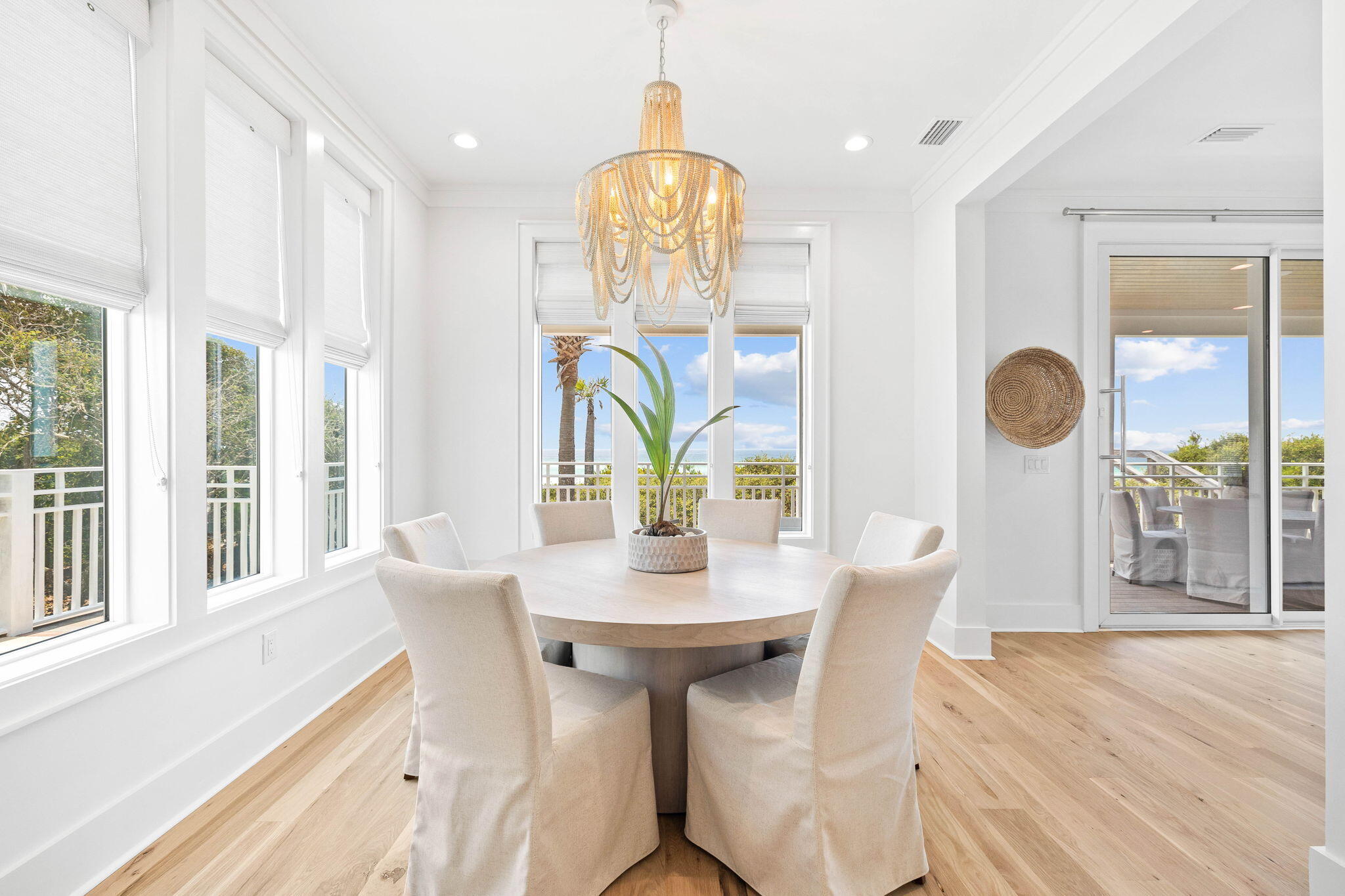 357 Old Beach Road Santa Rosa Beach, FL 32459 - Photo 18 of 106 a dining room with furniture and window