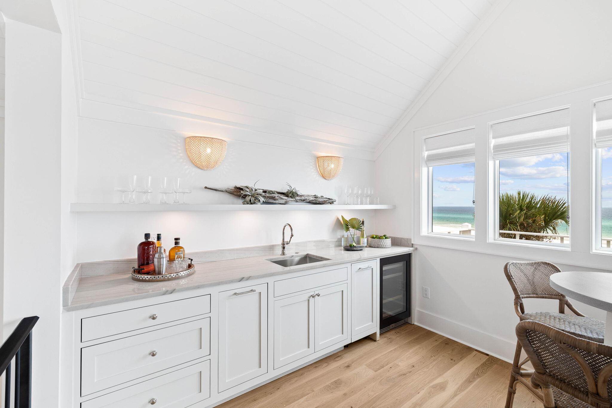 357 Old Beach Road Santa Rosa Beach, FL 32459 - Photo 48 of 106 a kitchen with a sink cabinets and window
