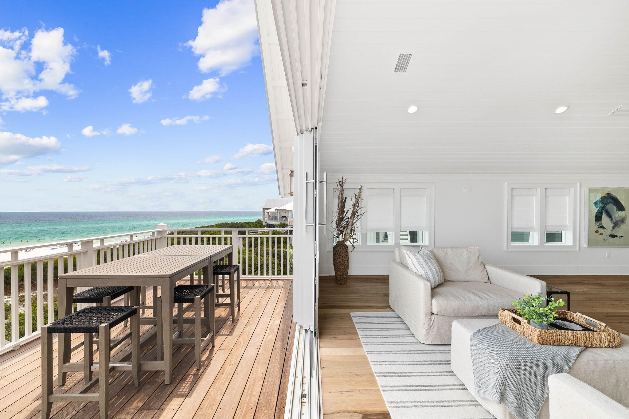 357 Old Beach Road Santa Rosa Beach, FL 32459 - Photo 49 of 106 a balcony with furniture and wooden floor