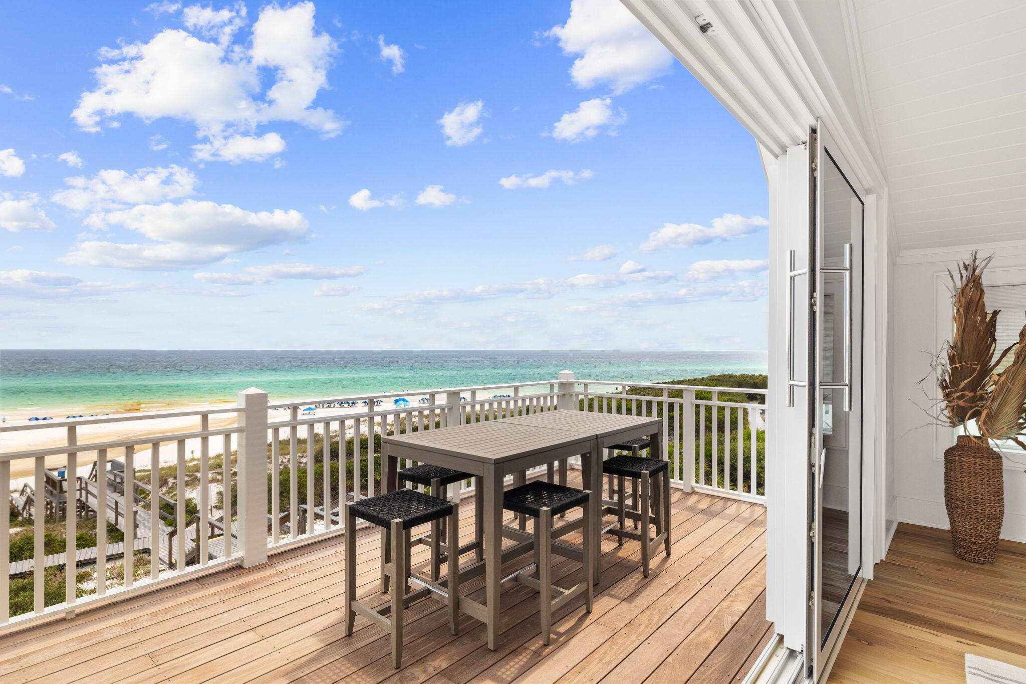 357 Old Beach Road Santa Rosa Beach, FL 32459 - Photo 50 of 106 a view of a balcony with furniture and wooden floor