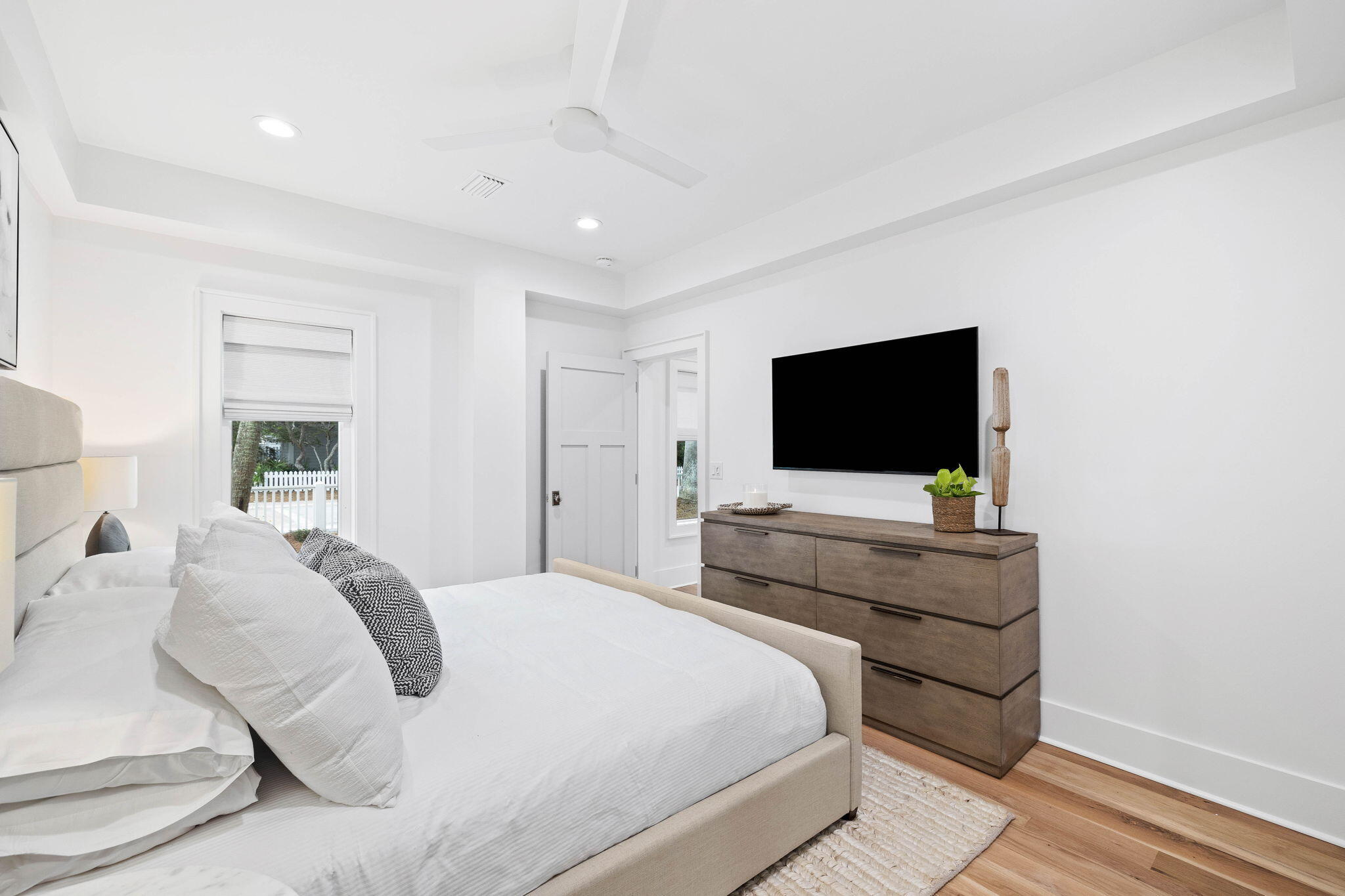 357 Old Beach Road Santa Rosa Beach, FL 32459 - Photo 58 of 106 a bedroom with bed and a flat screen tv