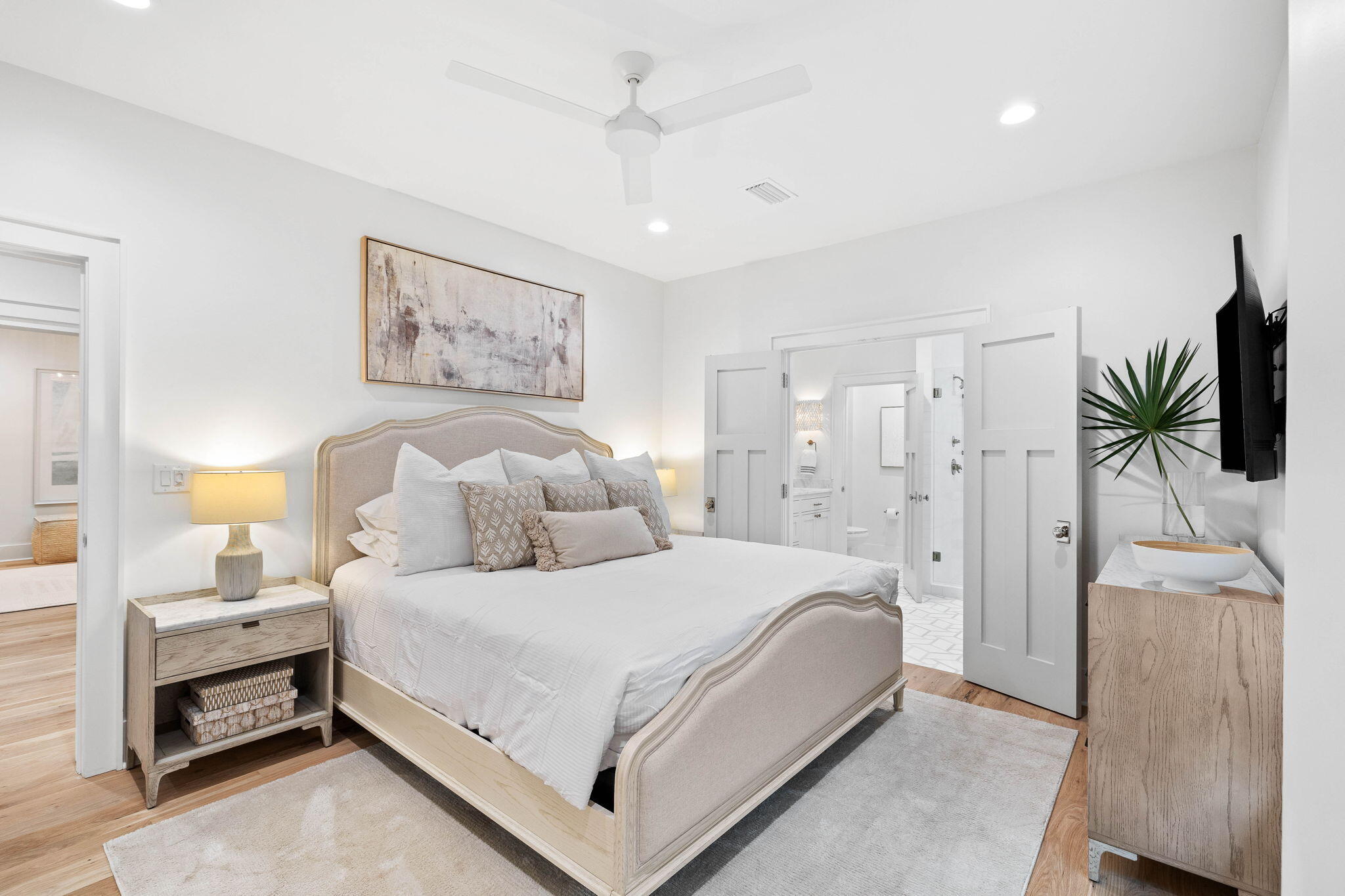 357 Old Beach Road Santa Rosa Beach, FL 32459 - Photo 60 of 106 a bedroom with a bed and a chandelier