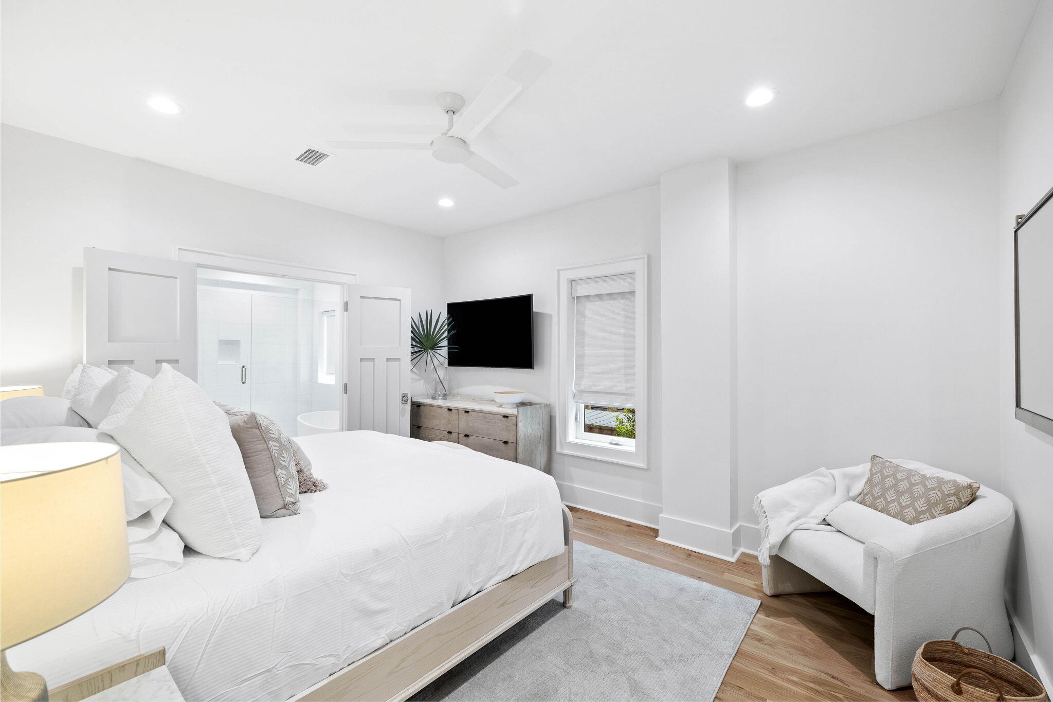 357 Old Beach Road Santa Rosa Beach, FL 32459 - Photo 61 of 106 a bedroom with a bed and a flat screen tv