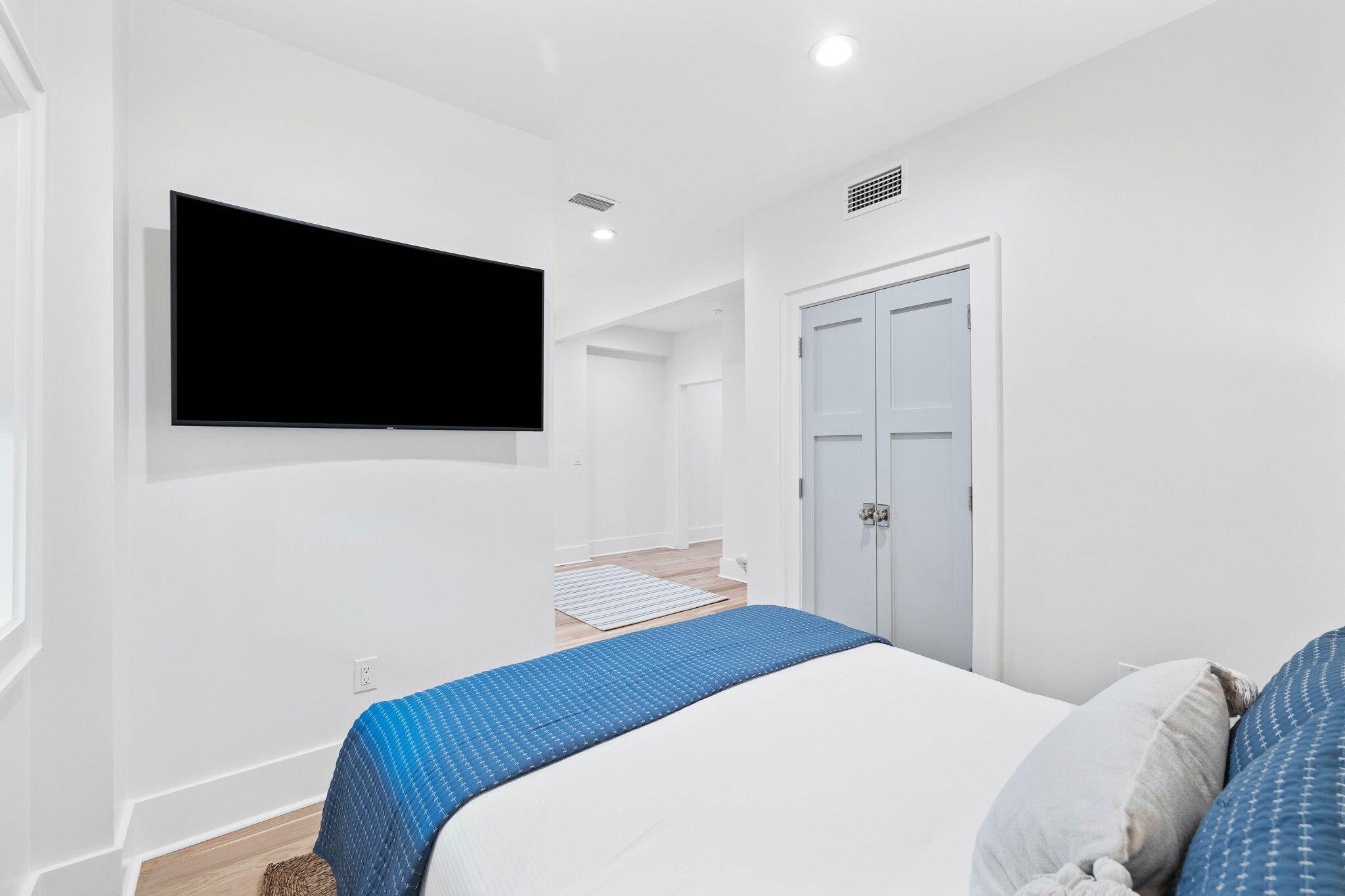 357 Old Beach Road Santa Rosa Beach, FL 32459 - Photo 66 of 106 a bedroom with a bed and a flat screen tv