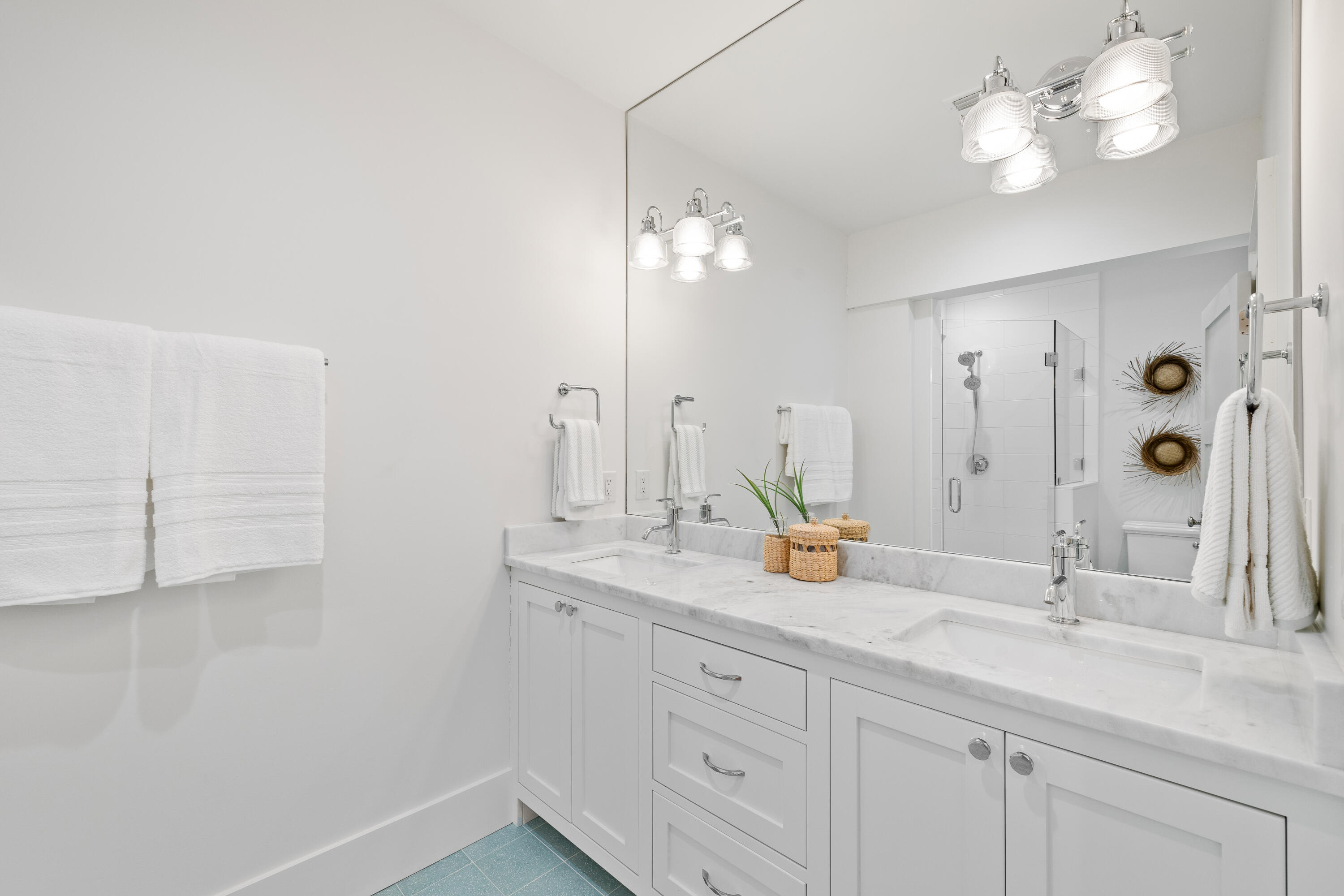 357 Old Beach Road Santa Rosa Beach, FL 32459 - Photo 72 of 106 a bathroom with a double vanity sink and a mirror