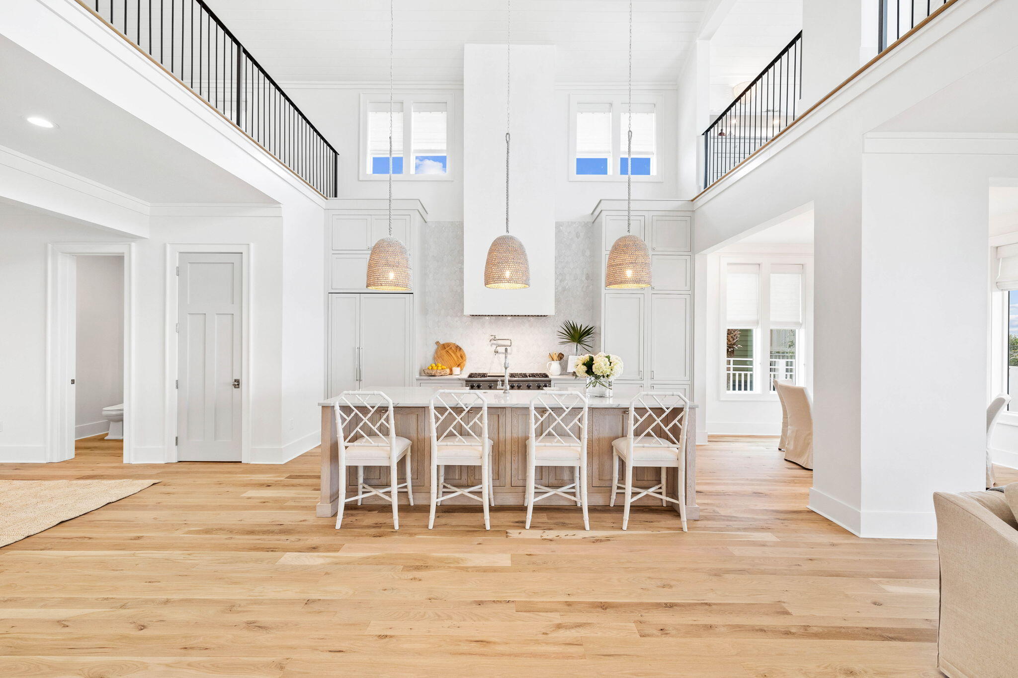 357 Old Beach Road Santa Rosa Beach, FL 32459 - Photo 10 of 106 a view of a dining room with furniture and wooden floor