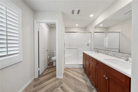 a view of a hallway view with staircase