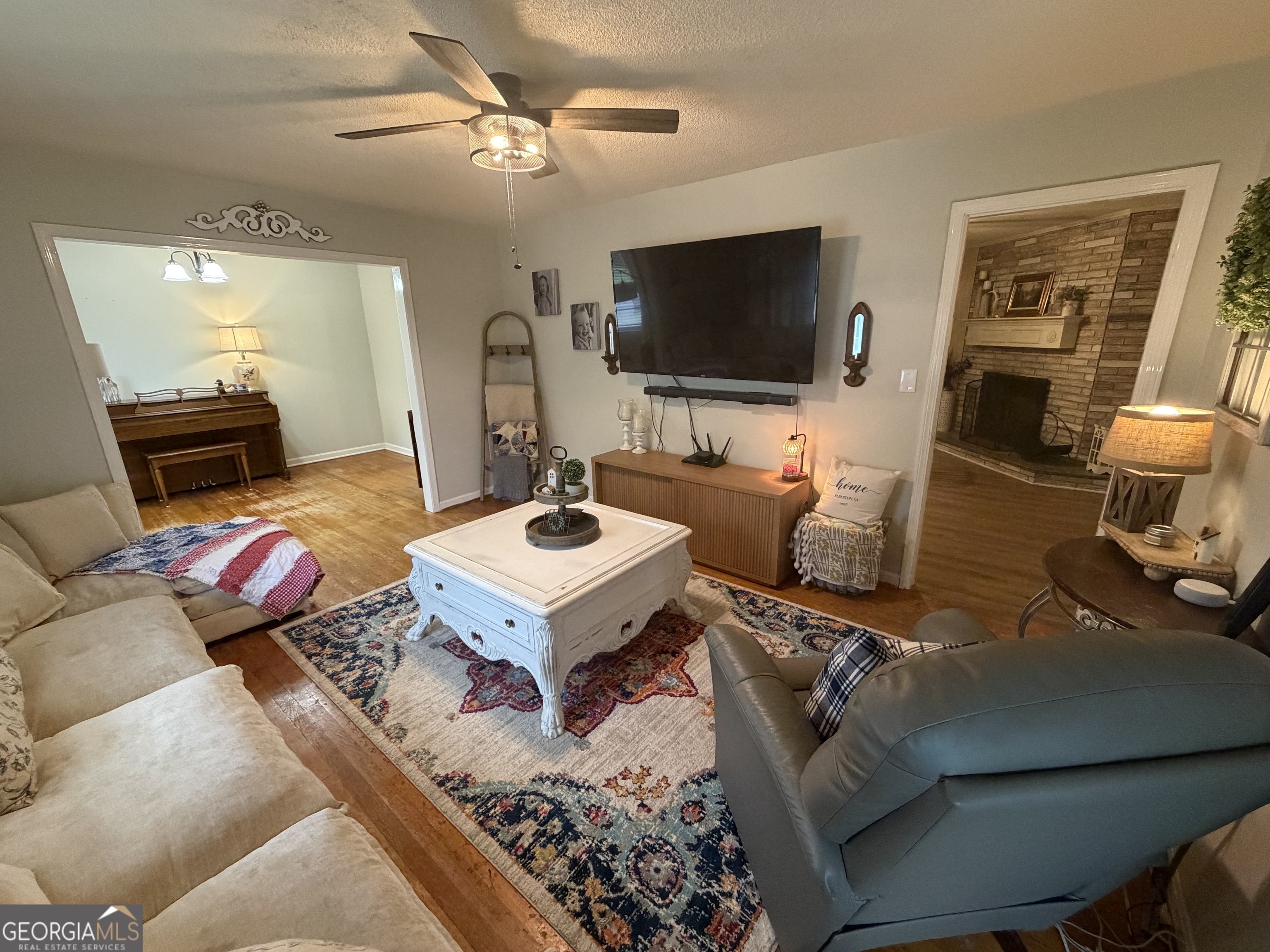 410 Ridgecrest Drive Elberton, GA 30635 - Photo 12 of 29 a living room with furniture and a flat screen tv