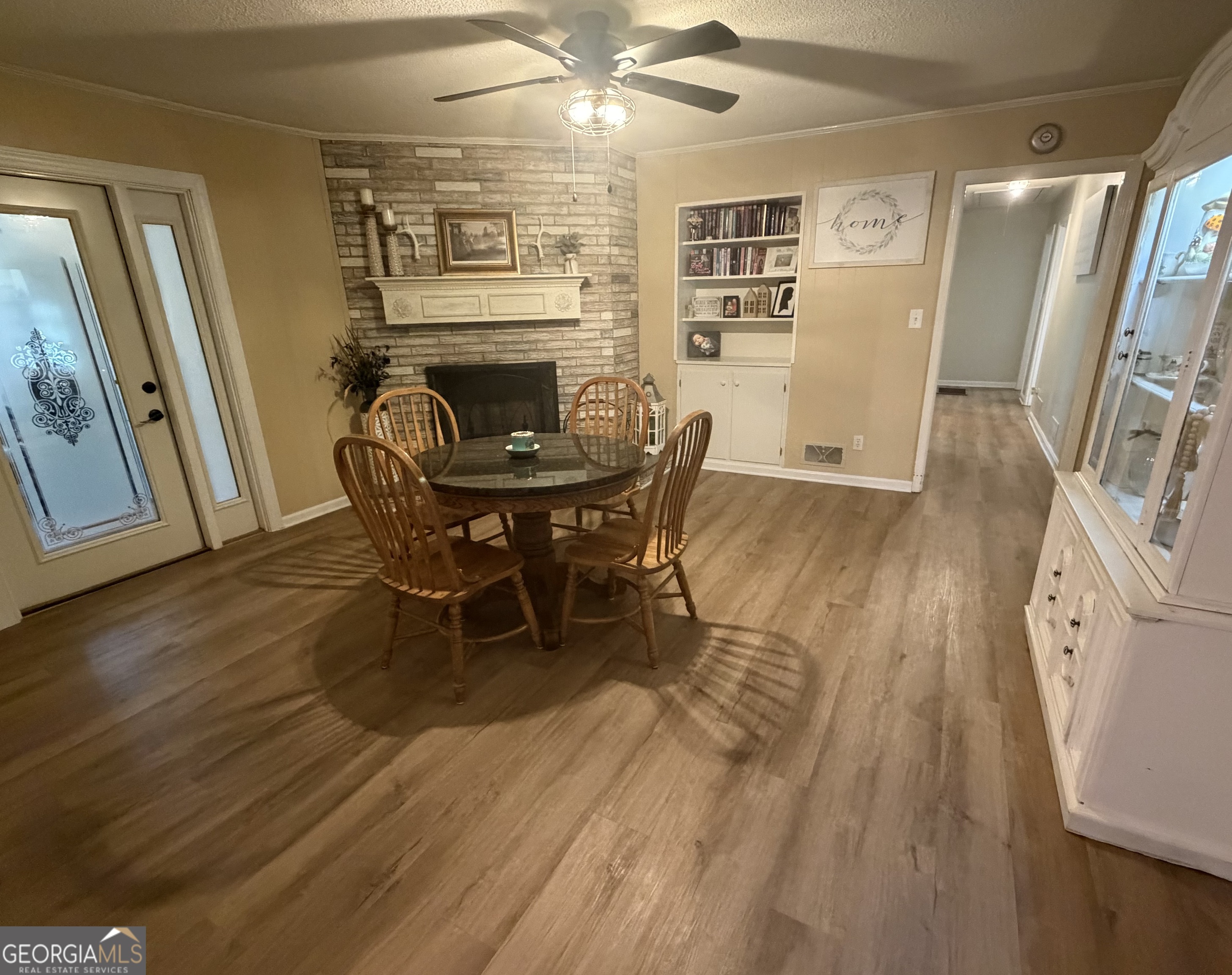 410 Ridgecrest Drive Elberton, GA 30635 - Photo 13 of 29 a view of a dining room with furniture and wooden floor
