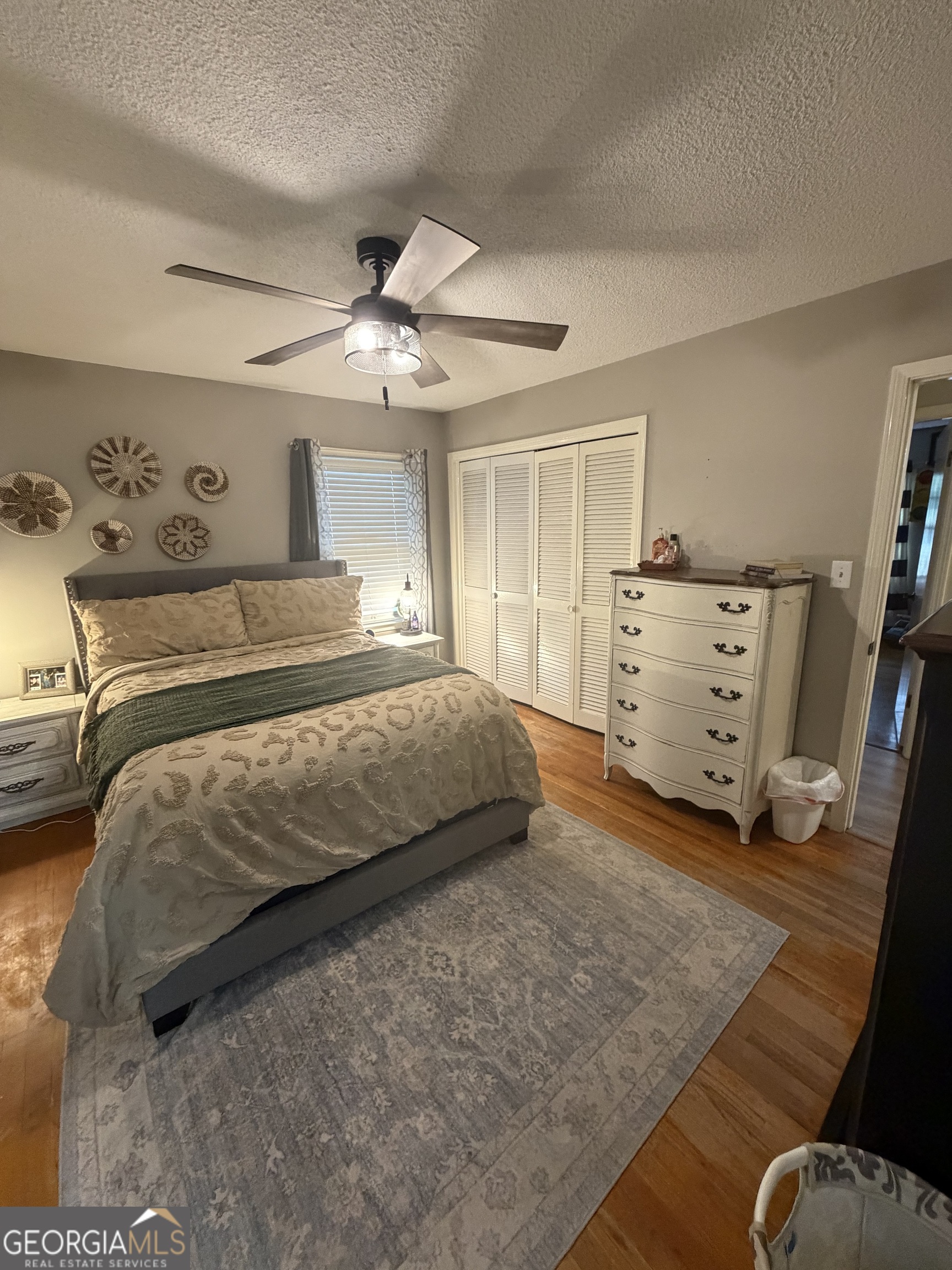410 Ridgecrest Drive Elberton, GA 30635 - Photo 21 of 29 a bedroom with a bed and ceiling fan