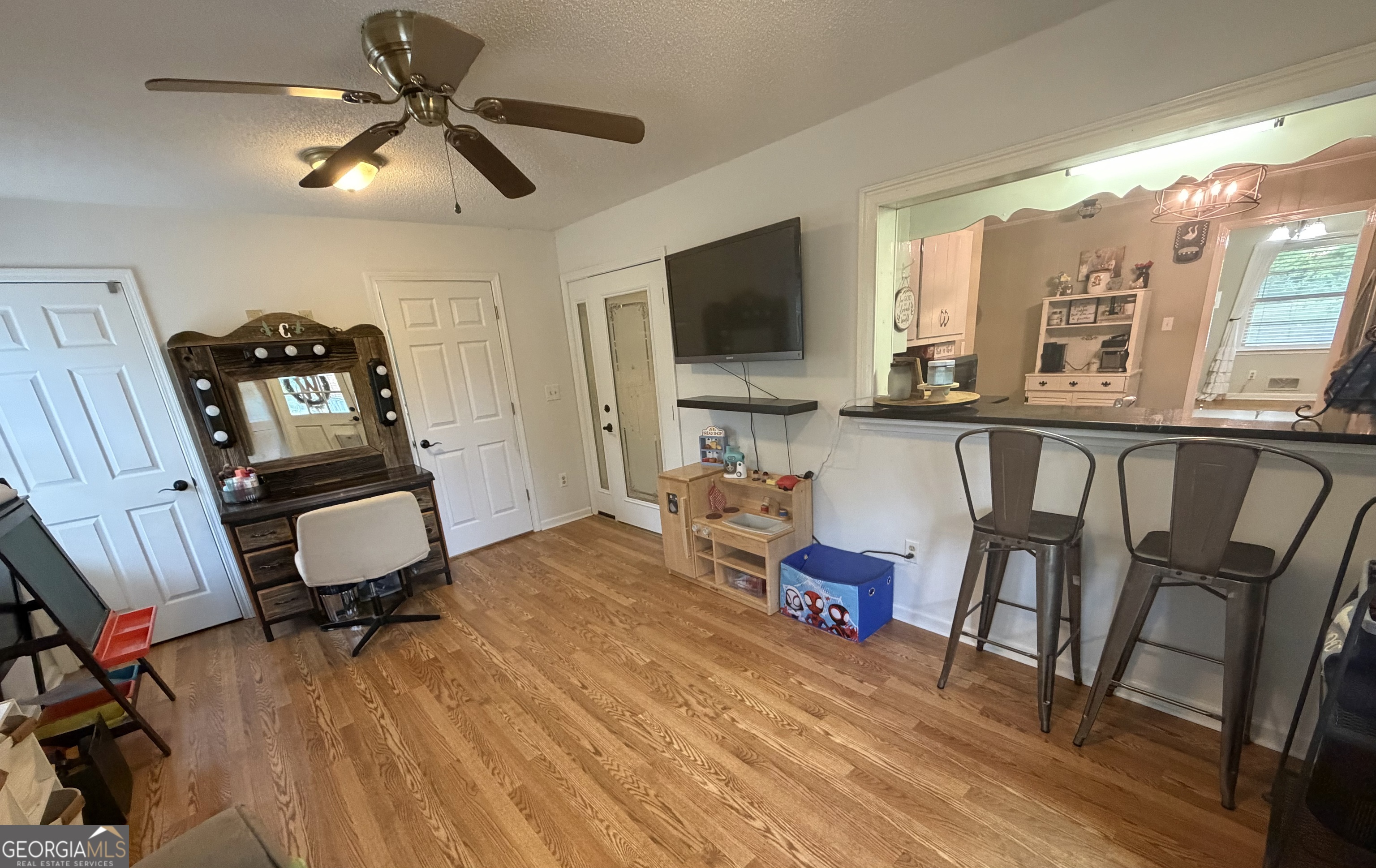 410 Ridgecrest Drive Elberton, GA 30635 - Photo 23 of 29 a view of a workspace with furniture and wooden floor