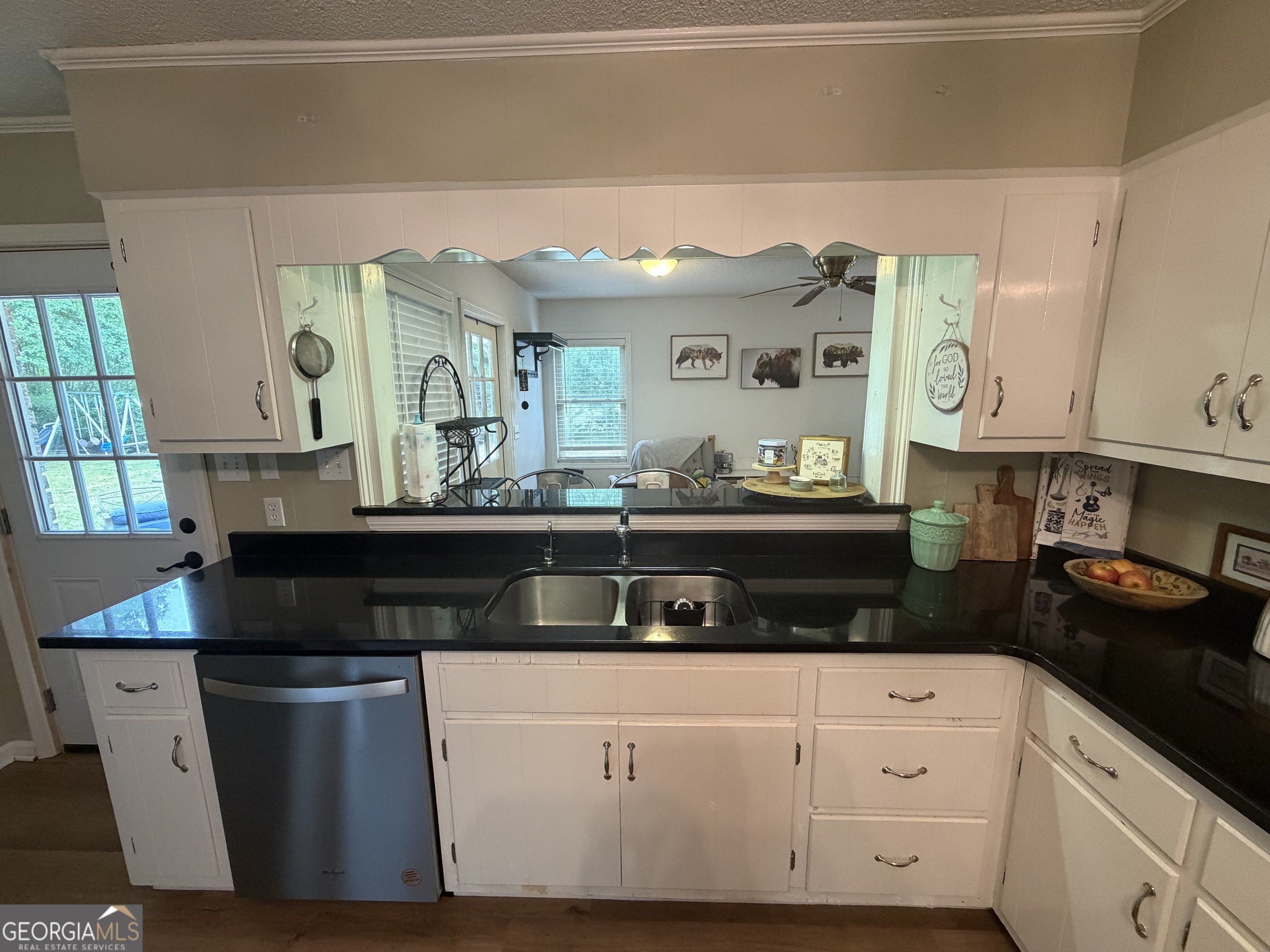 410 Ridgecrest Drive Elberton, GA 30635 - Photo 8 of 29 a kitchen with stainless steel appliances granite countertop a sink and cabinets