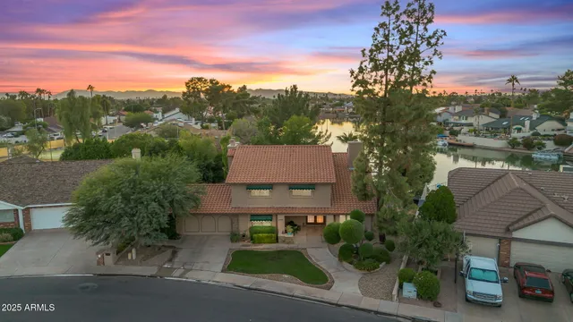 a bathroom with a tub a sink and a window
