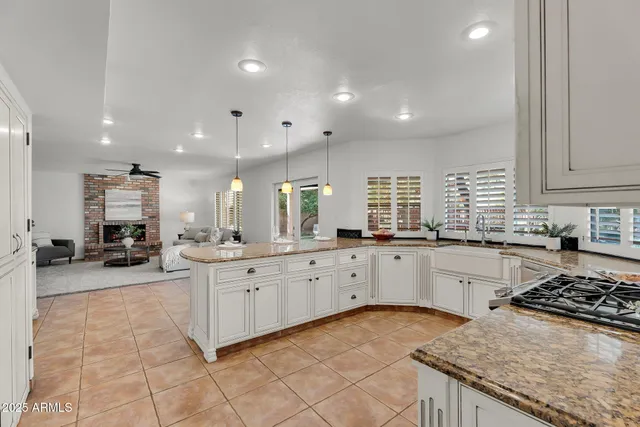 a view of a terrace with furniture and stove