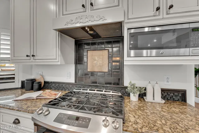 a view of a park with large trees