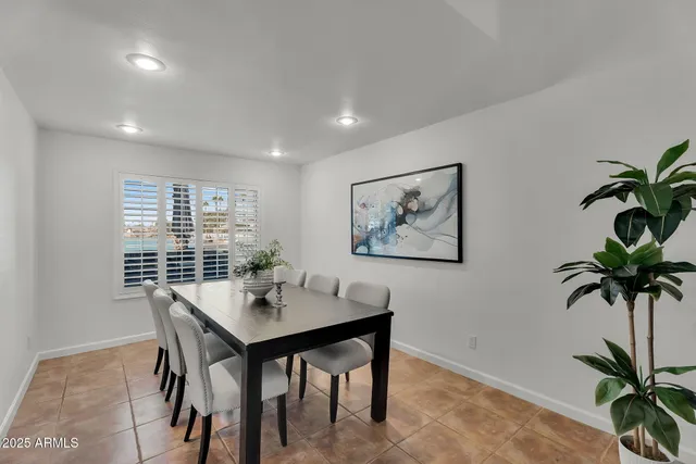 a view of backyard with outdoor seating a patio and a garden