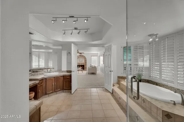 a view of a house with a yard and sitting area