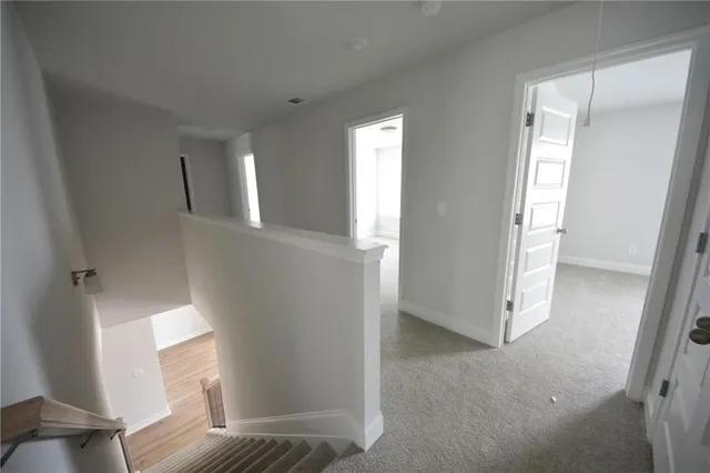 an empty room with a mirror