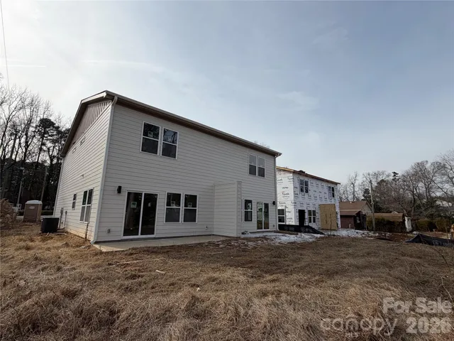 a house view with a backyard space
