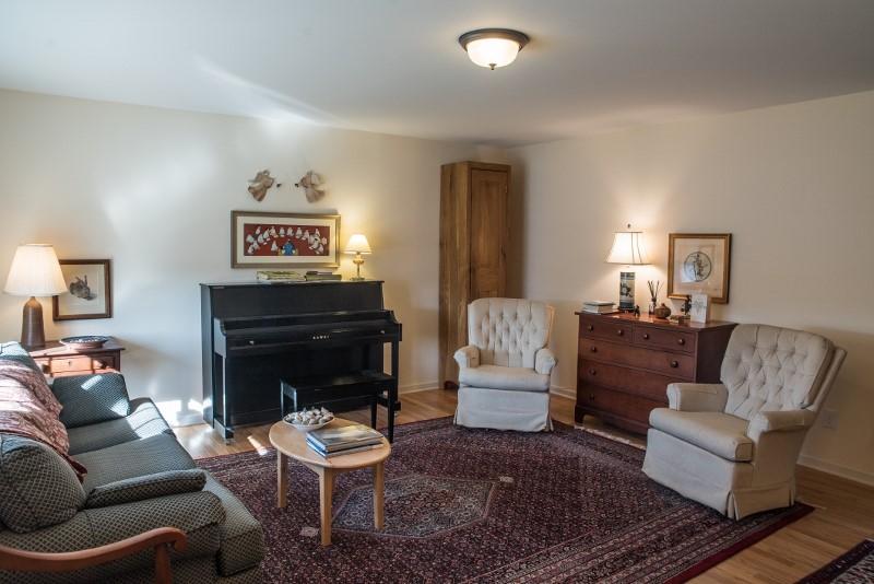 923 Long Level Road Southwest Floyd, VA 24091 - Photo 8 of 33 a living room with furniture and a fireplace