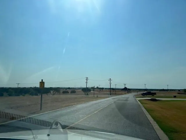 a view of a lake from a yard