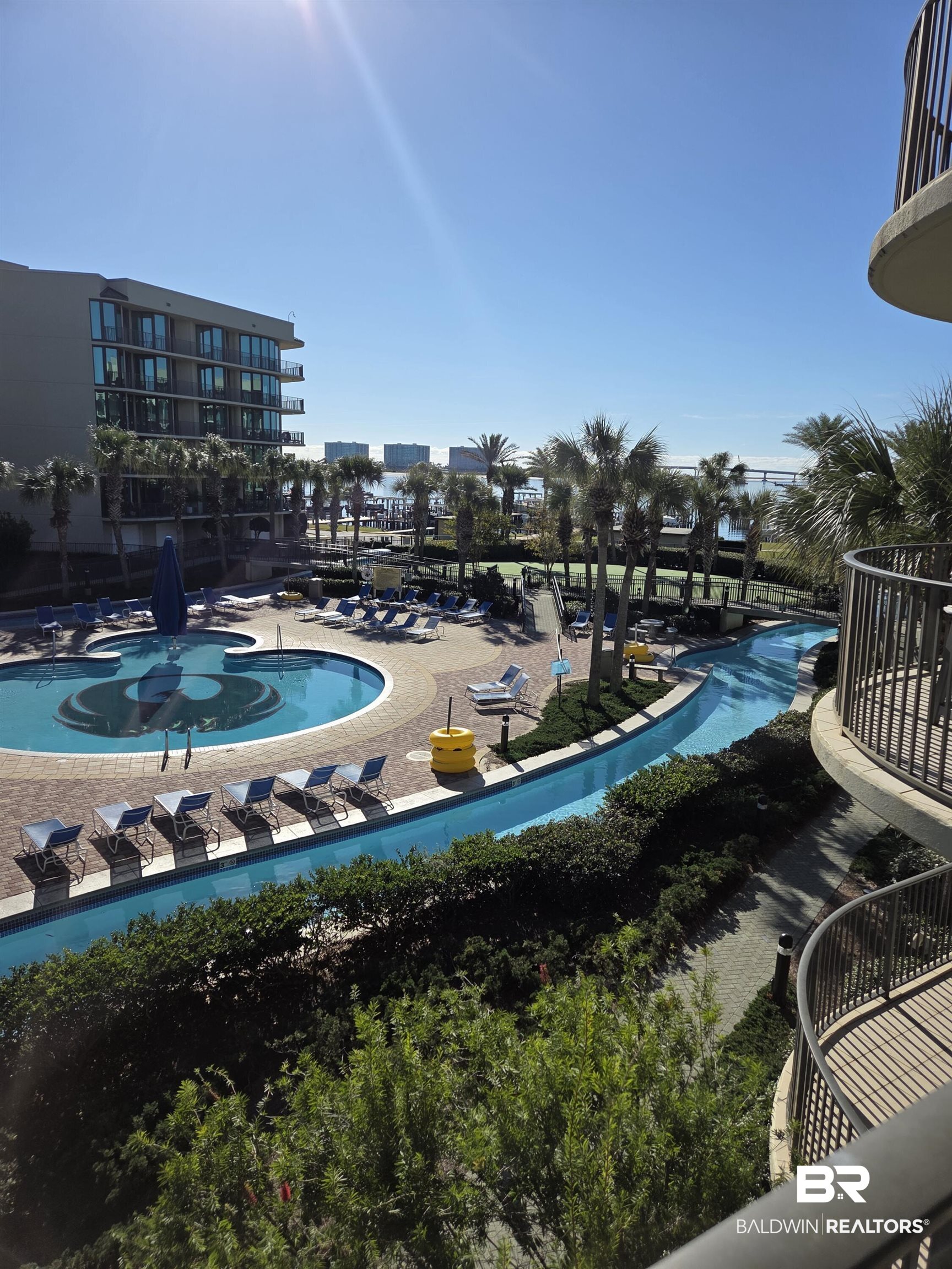 27580 Canal Road, Unit 1210 Orange Beach, AL 36561 - Photo 3 of 28 Community pool with a patio area