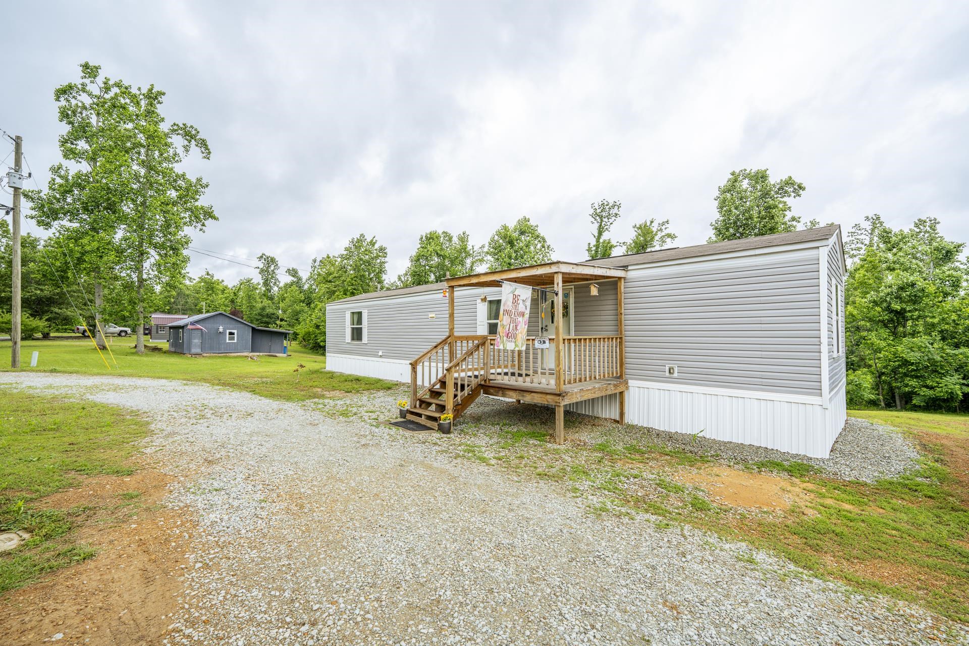 a house with trees in the background