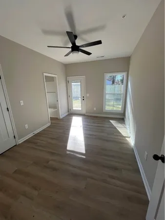 a view of an empty room and window
