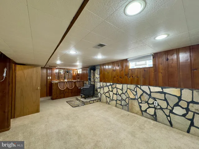 a bathroom with a toilet and a sink