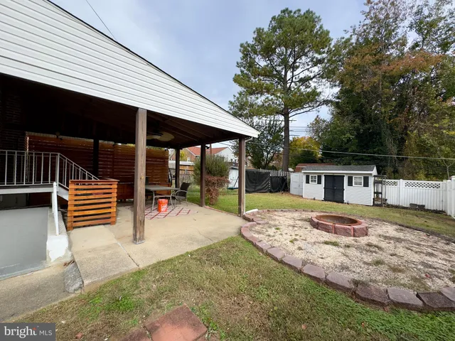 a house view with a backyard space