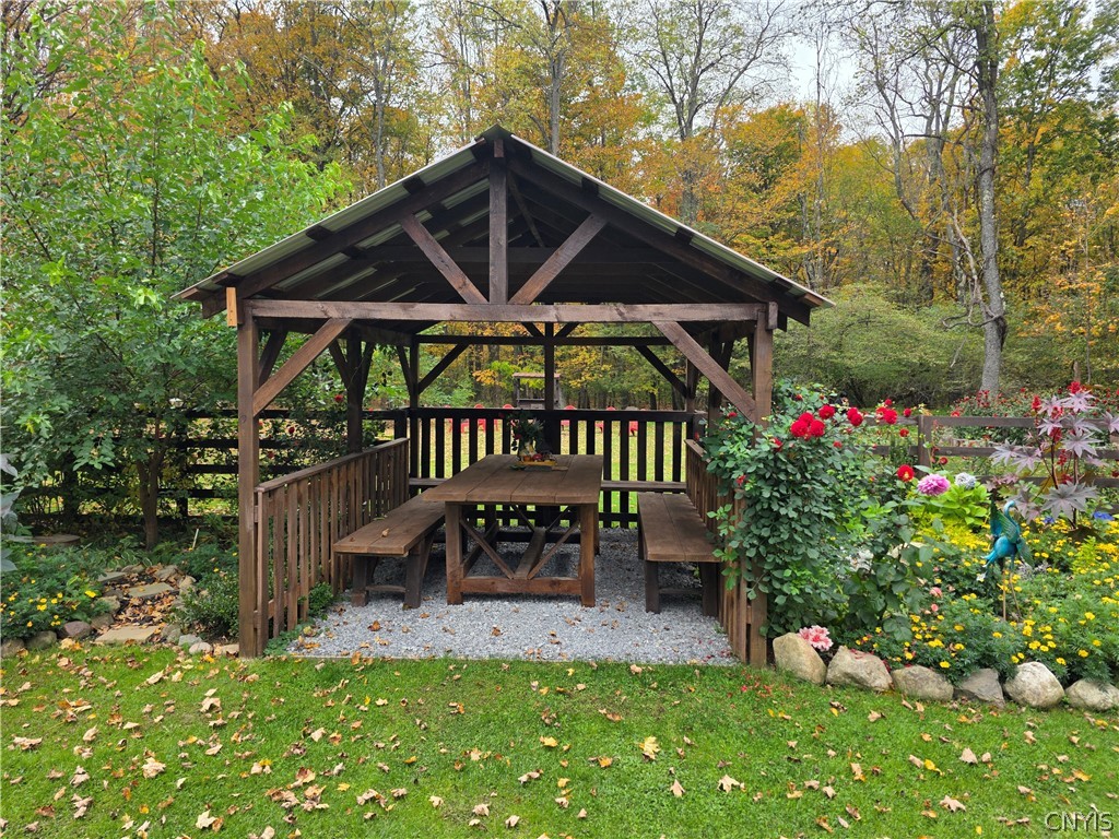 1053 Grant Road Russia, NY 13324 - Photo 33 of 47 A timber pavilion stands amidst lush gardens and m
