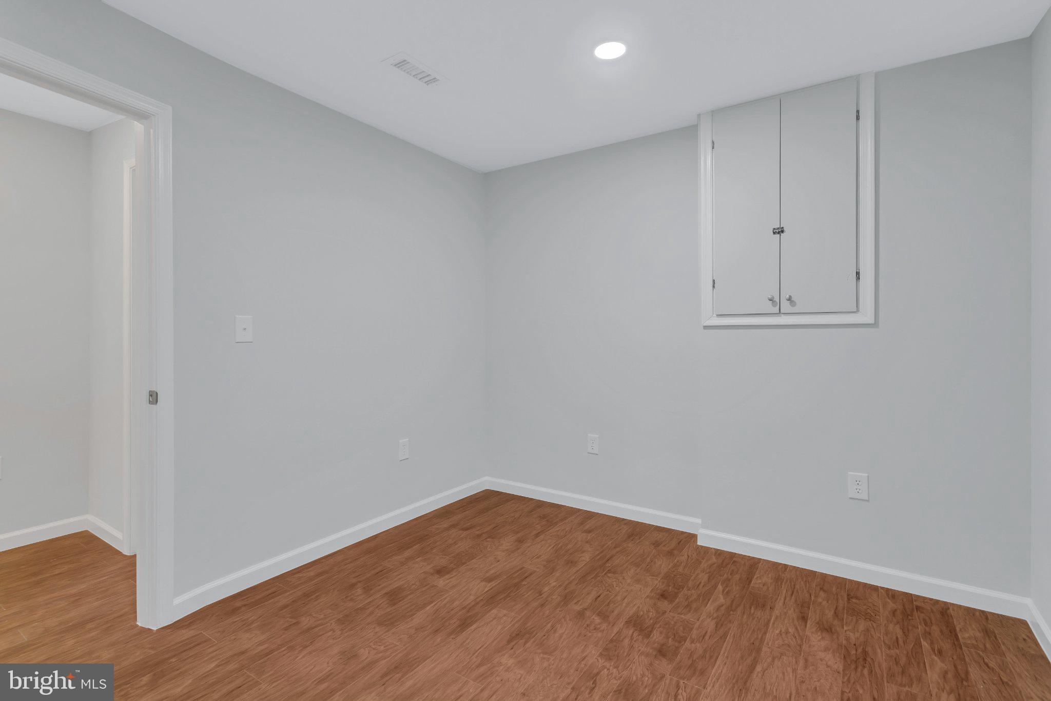 9009 Sweet Birch Court Springfield, VA 22152 - Photo 32 of 34 Versatile space with warm wood tones.
