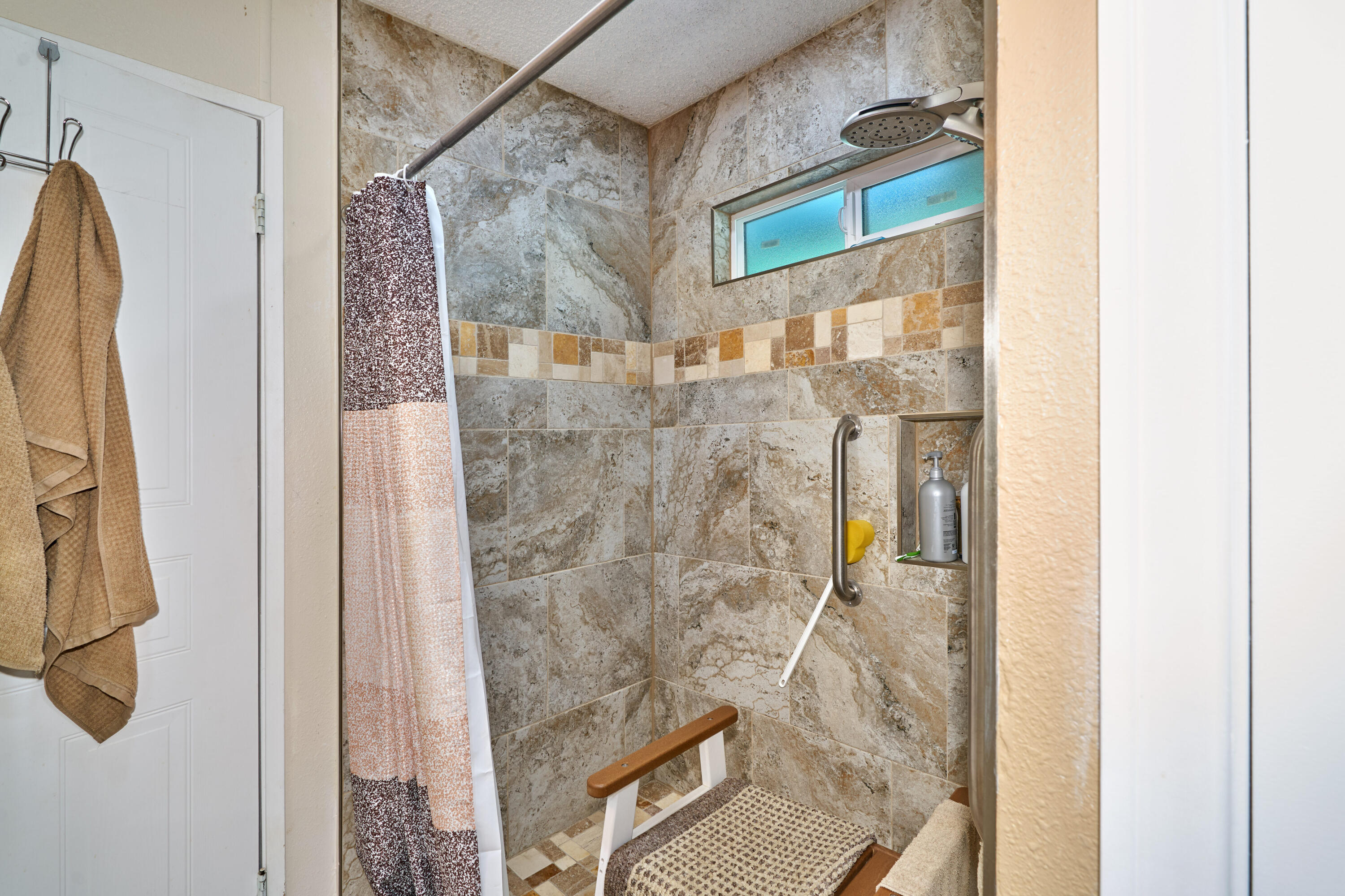 33537 Lisa Circle Thousand Palms, CA 92276 - Photo 15 of 35 a bathroom with a shower and a glass door