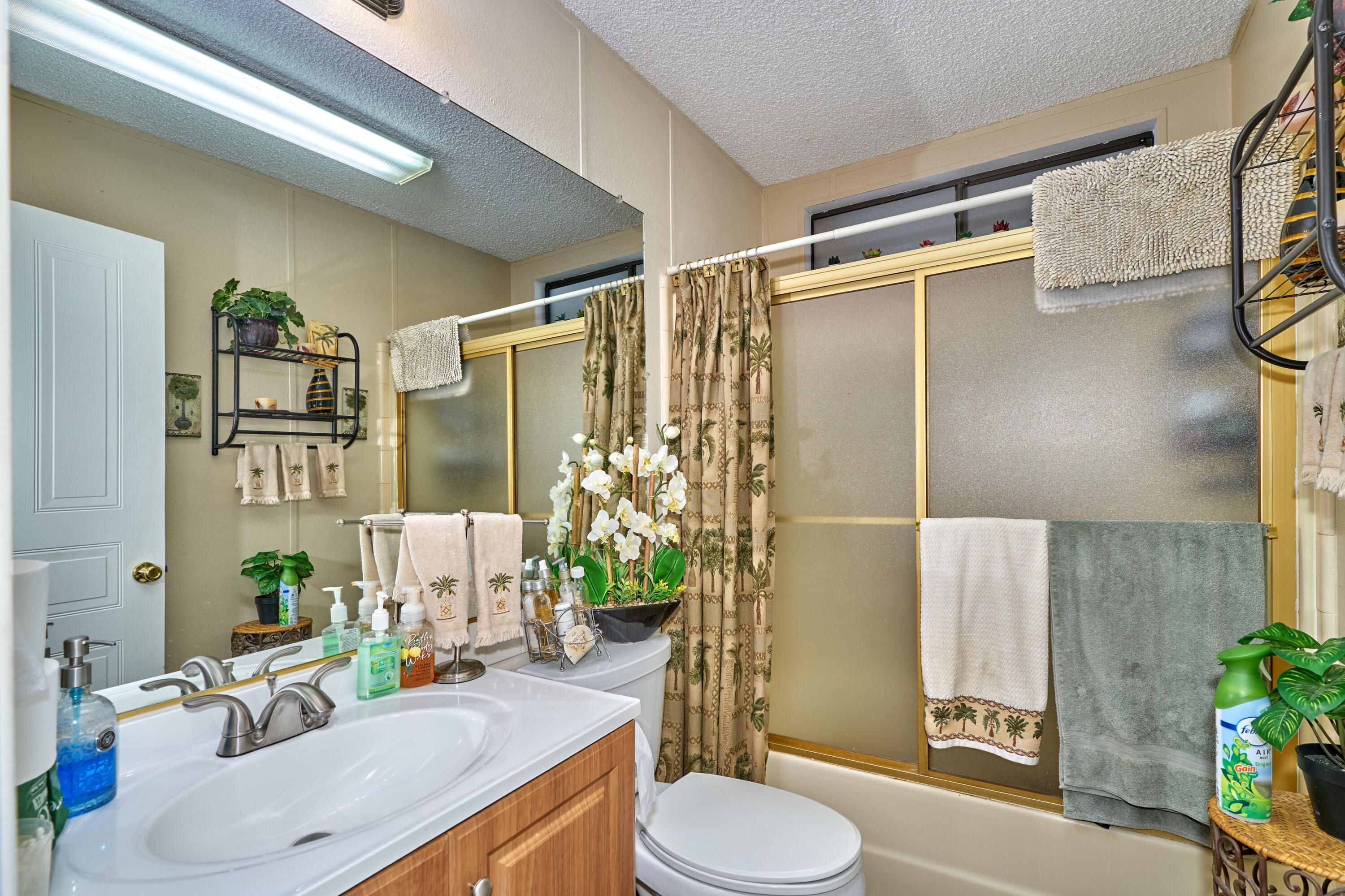 33537 Lisa Circle Thousand Palms, CA 92276 - Photo 17 of 35 a bathroom with a sink toilet and shower